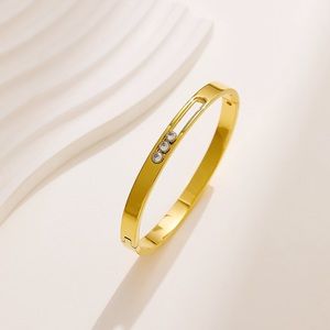3 CZ Stones Gold Bangle Bracelet